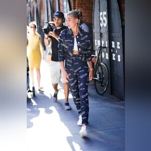 2. NWOT VERSACE LOGO MANIA HIGH WAISTED JEANS